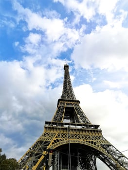 A beautiful picture of the Eiffel Tower in Paris, the capital of France, with a wonderful background in wonderful natural colors photo