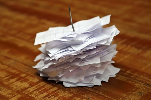 paper restaurant order nail on wooden table photo