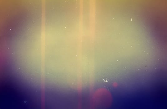 Vintage Grunge Background with Lens Light Leak and Dusty Overlay. photo