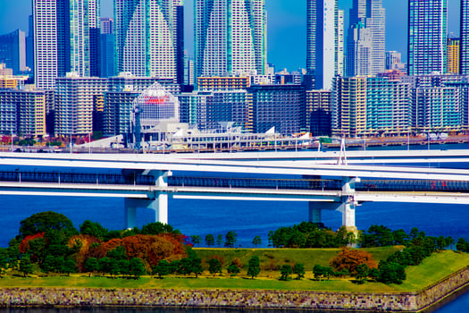 Moving cars on the highway at the urban city in Tokyo long shot photo