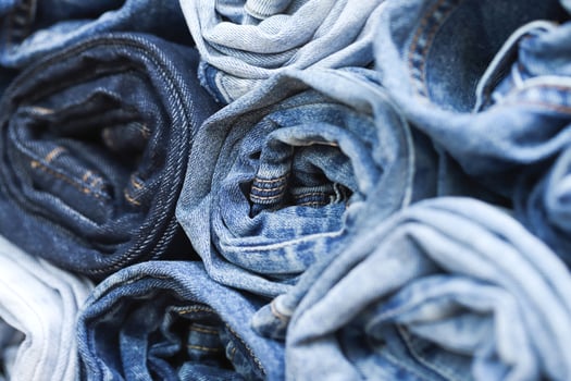 beautiful fashion jeans Stacked in layers at the jeans store photo