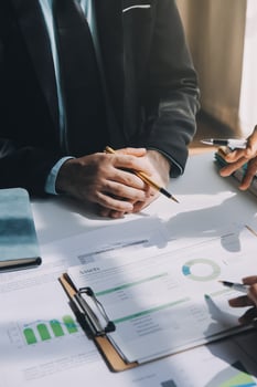 Business team meeting present, investor colleagues consultation and conference new strategy plan business and market growth on financial document graph report, Meeting and Talking. photo
