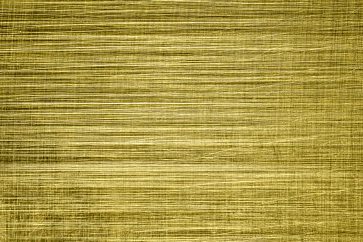 Golden texture of shiny scratched metal. Abstract gold background. photo