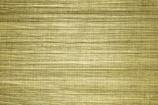Golden texture of shiny scratched metal. Abstract gold background. photo