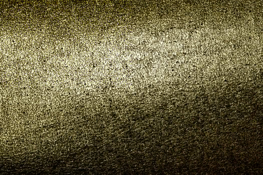 Shiny gold metal texture. Golden abstract background. photo