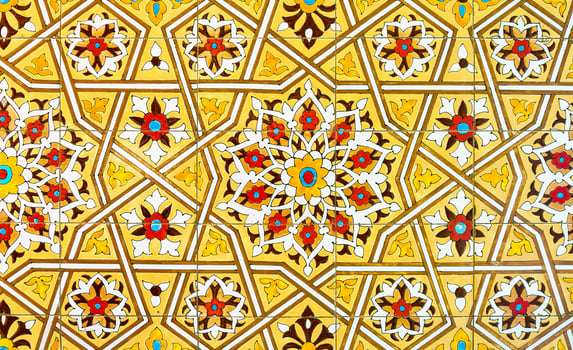Geometric traditional Islamic ornament. Fragment of a ceramic mosaic. photo