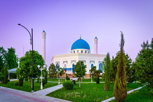 The Minor Mosque covered with white marble in the center of Tashkent at sunset. photo