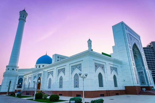 The Minor Mosque covered with white marble in the center of Tashkent at sunset. photo