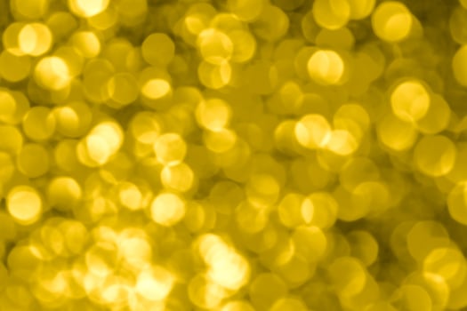 Golden lights abstract bokeh background. Yellow lights. photo