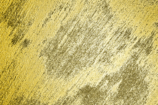 Texture of golden decorative plaster or concrete. Abstract gold grunge background. photo