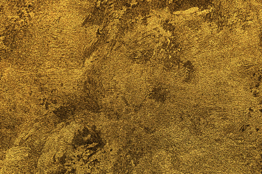 Texture of golden decorative plaster or concrete. Abstract gold grunge background. photo