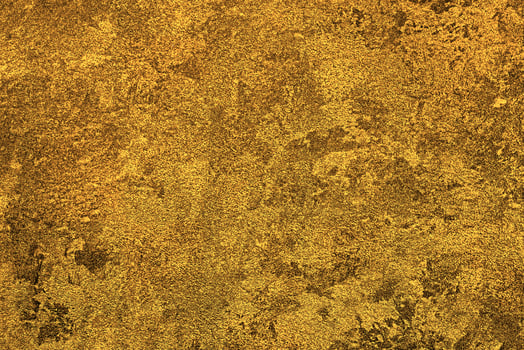 Texture of golden decorative plaster or concrete. Abstract gold grunge background. photo