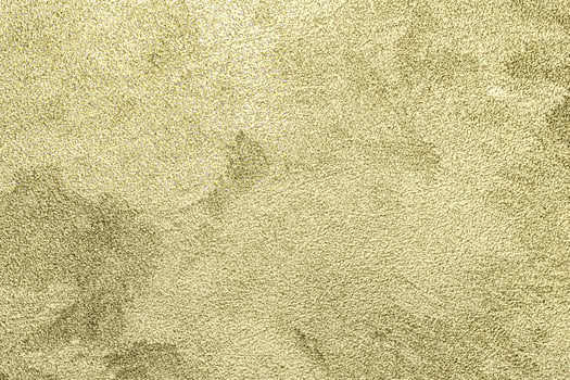 Texture of golden decorative plaster or concrete. Abstract gold grunge background. photo