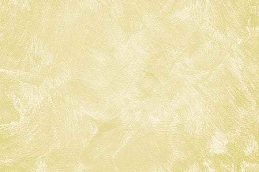 Texture of golden decorative plaster or concrete. Abstract gold grunge background. photo