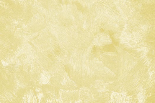 Texture of golden decorative plaster or concrete. Abstract gold grunge background. photo