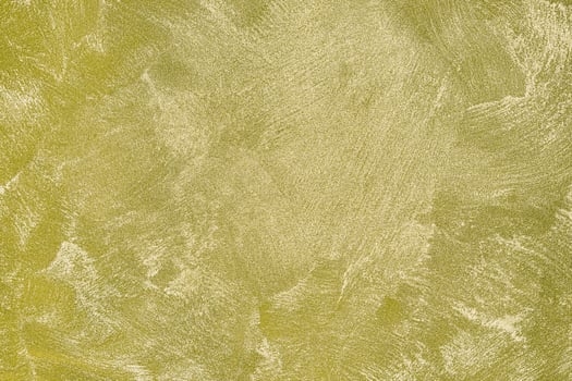 Texture of golden decorative plaster or concrete. Abstract gold grunge background. photo