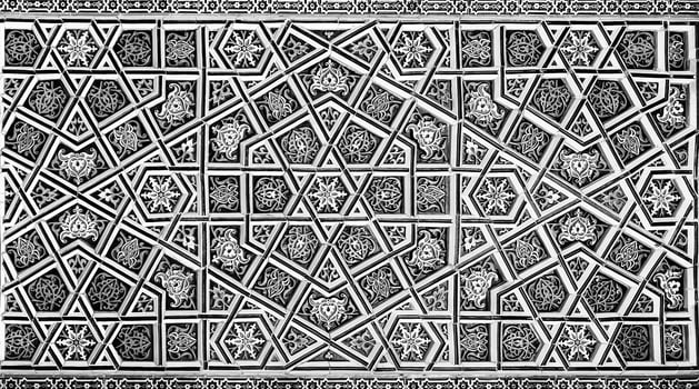 Geometric traditional Islamic ornament. Fragment of a ceramic mosaic. Black and white. photo