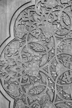 Black and white carved wooden doors with patterns and mosaics. 7 photo