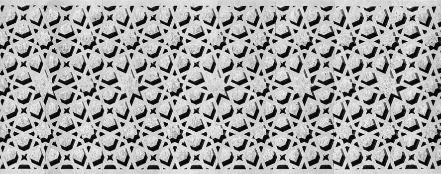 Black and white Geometric traditional Islamic ornament. Fragment of a mosaic.Abstract background. photo