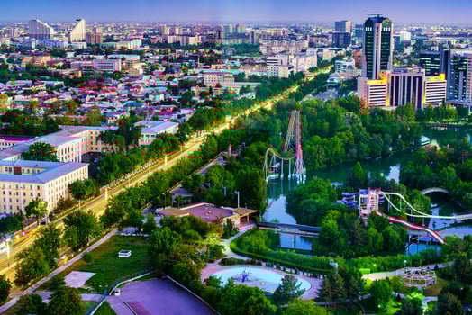 Uzbekistan, Tashkent - April 24, 2023 Top view from the observation deck on the Tashkent TV tower to the central part of the city during the twilight. photo