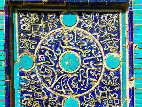 Geometric traditional Islamic ornament. Fragment of a ceramic mosaic. photo