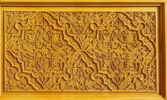 Fragment of a carved wooden door. Ornate. photo