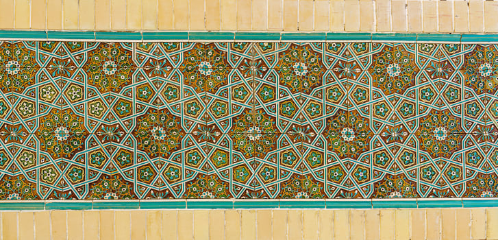 Geometric traditional Islamic ornament. Fragment of a ceramic mosaic. photo