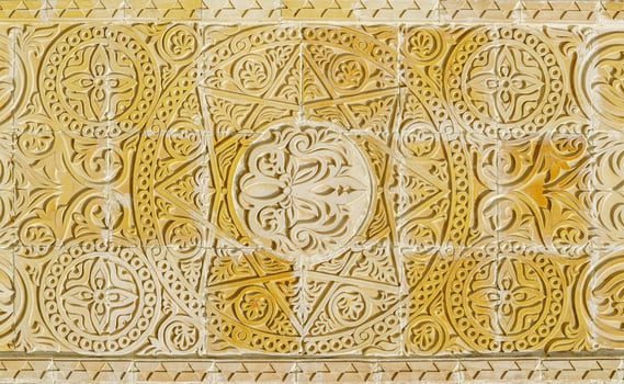 Geometric traditional Islamic ornament. Fragment of a ceramic mosaic. photo