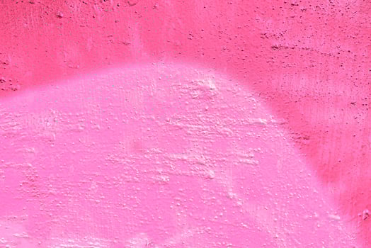 Colorful graffiti painted on a wall. Abstract urban background. Spray painting art. photo