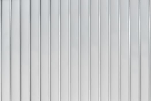 The texture of the cladding of the building from metal aluminum panels. Abstract background. photo