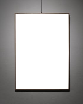 Picture frames with copy space for text hanging on the wall with wallpaper. Mockup for design. photo