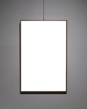 Picture frames with copy space for text hanging on the wall with wallpaper. Mockup for design. photo
