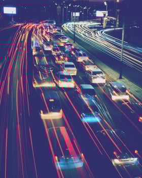 Car traffic light at night city. photo