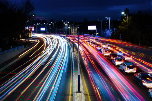 Car traffic light at night city. photo