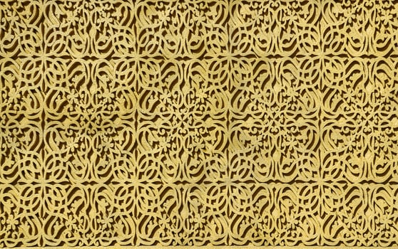 Geometric traditional Islamic ornament. Fragment of a concrete mosaic. photo
