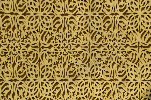 Geometric traditional Islamic ornament. Fragment of a concrete mosaic. photo
