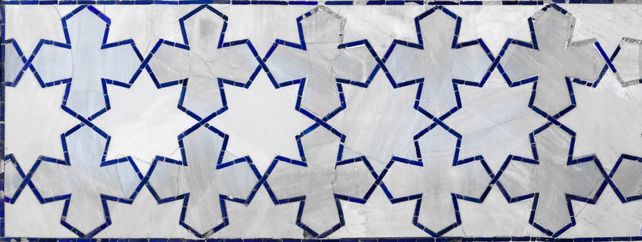 Geometric traditional Islamic ornament. Fragment of a ceramic mosaic. photo