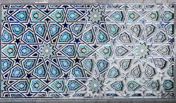 Geometric traditional Islamic ornament. Fragment of a ceramic mosaic. Abstract background. photo
