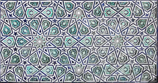 Geometric traditional Islamic ornament. Fragment of a ceramic mosaic. Abstract background. photo