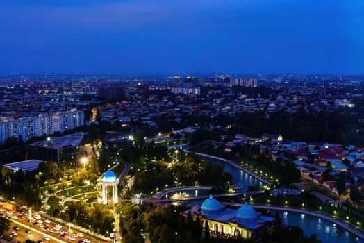 Uzbekistan, Tashkent - September 29, 2023 Top view from the observation deck on the Tashkent TV tower to the central part of the city covered with smog at nighttime . Air polution. photo