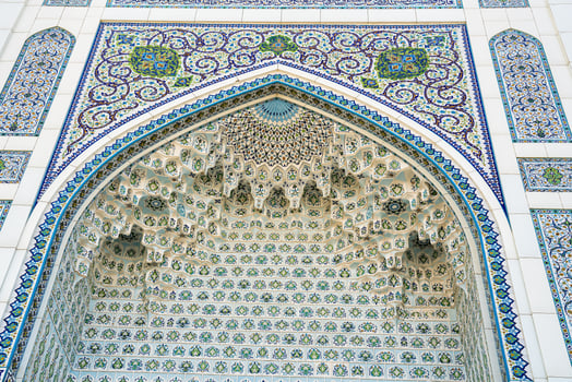 Geometric traditional Islamic ornament. Fragment of a ceramic mosaic. photo