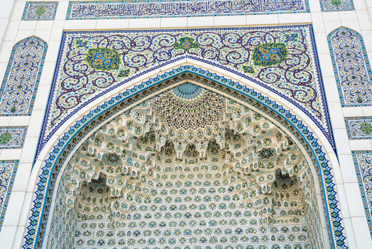 Geometric traditional Islamic ornament. Fragment of a ceramic mosaic. photo