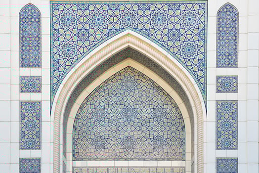 Geometric traditional Islamic ornament. Fragment of a ceramic mosaic. photo