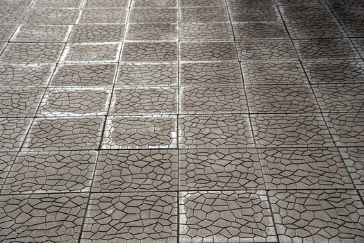 The texture of a tiled pavement with perspective. photo