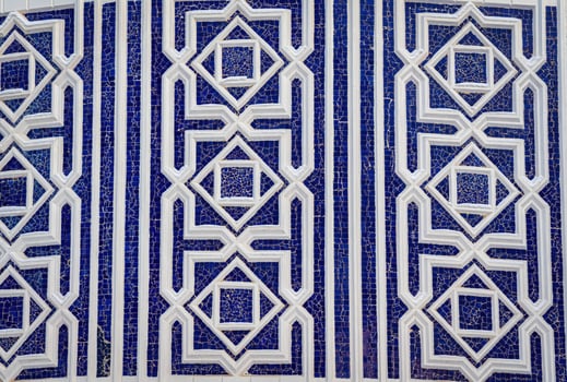 Geometric traditional Islamic ornament. Fragment of a ceramic mosaic. photo