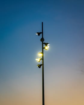 Lighting Modern LED lantern against the twilight sky. photo