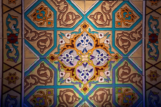 Geometric traditional Islamic ornament. Fragment of a ceramic mosaic. photo