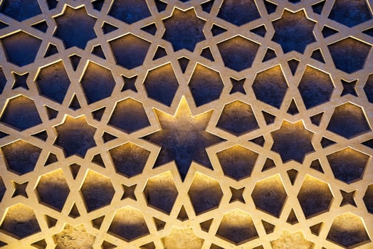 Geometric traditional Islamic ornament. Fragment of a mosaic. photo