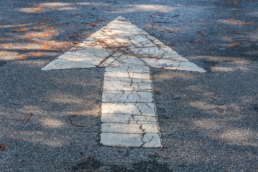 Forward arrow on the roadway photo