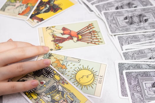 TVER, RUSSIA - FEBRUARY 18, 2024. Tarot cards, Tarot card divination, fortune telling. Occultism, esoteric education. photo
